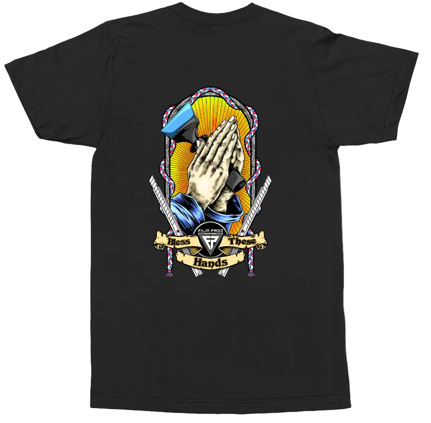 A black short-sleeve t-shirt with a large graphic print on the front showing praying hands, a blue and yellow sunburst, crossed swords, and a banner that reads 'Hands Together'.