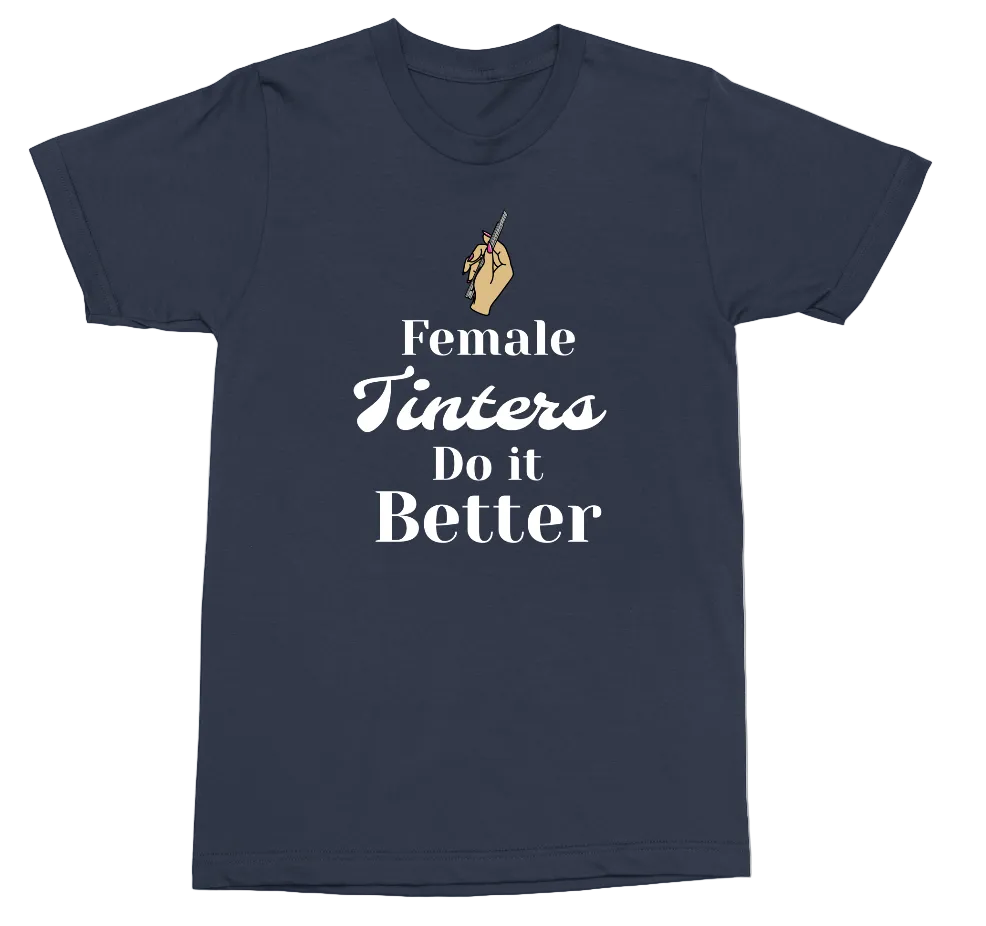 A navy blue short-sleeve t-shirt with a graphic print on the front. The graphic features a small gold hand holding a pointer above the text 'Female Tinters Do it Better' in white.