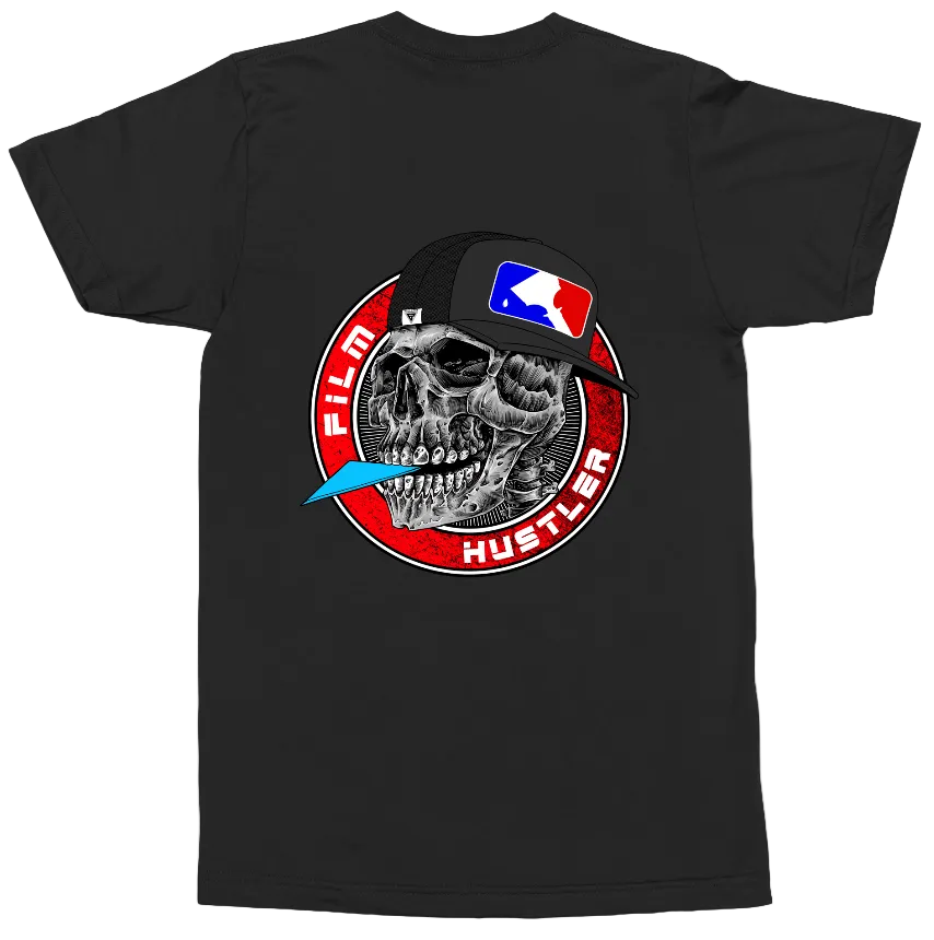 A black short-sleeve t-shirt with a circular graphic on the chest featuring a skull in a black baseball cap with a red, white, and blue logo, surrounded by a red circle with the text 'FILM HUSTLER' and a small blue feather detail.