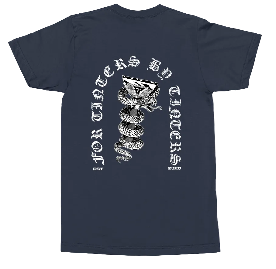 A navy blue short-sleeve t-shirt shown from the back, featuring a large white graphic print of a coiled snake wrapped around a triangular emblem, with the text 'FOR TANKERS BY TANKERS' arched above and 'SAVED' below.