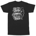 A black short-sleeve t-shirt with a white graphic print on the back. The graphic features the text 'Hide Your Torta Tint Your Troca' in a stylized cursive font, accompanied by a white line-art illustration of a pickup truck and a woman in a bikini.
