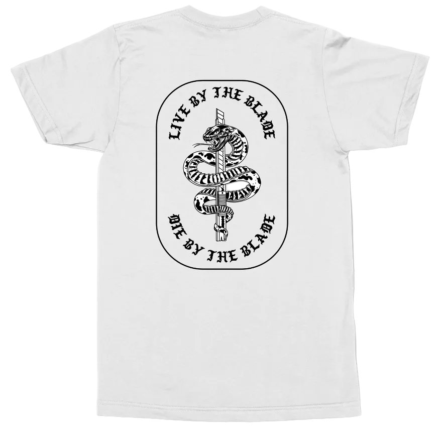 A white short-sleeve t-shirt shown from the back, featuring a large black graphic print of a coiled snake wrapped around a spear in an oval frame with the text 'LIVE BY THE BLADE' and 'DIE BY THE BLADE'.