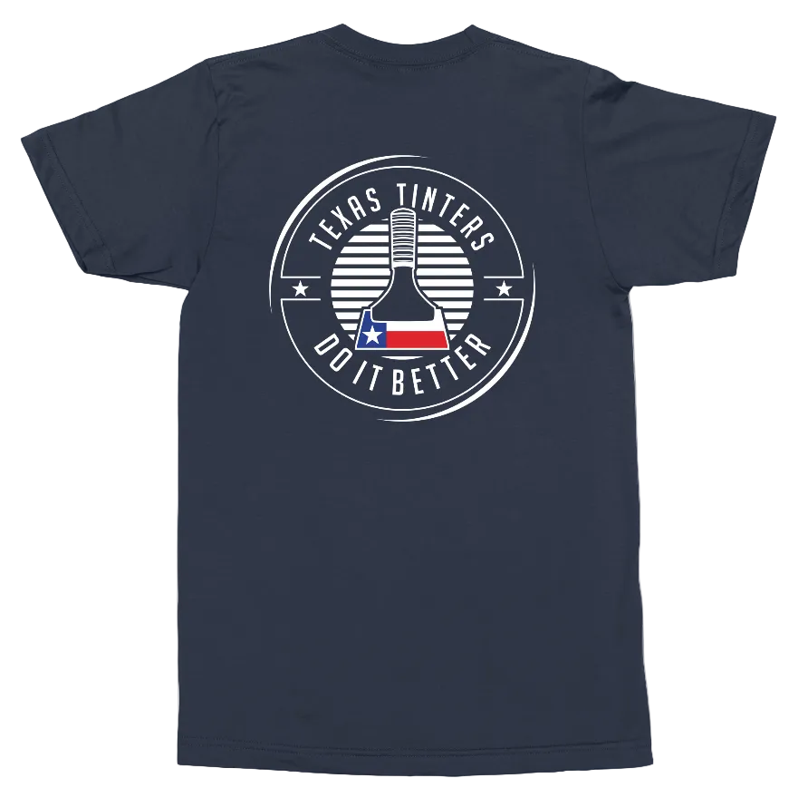 A navy blue short-sleeve t-shirt shown from the back, featuring a circular white graphic with the text 'TEXAS TINTERS DO IT BETTER' and a central bottle illustration decorated with the Texas flag.