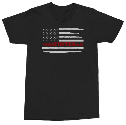 A black short-sleeve crewneck t-shirt featuring a distressed American flag graphic on the chest, with the word 'INTER' printed in red across the stripes.