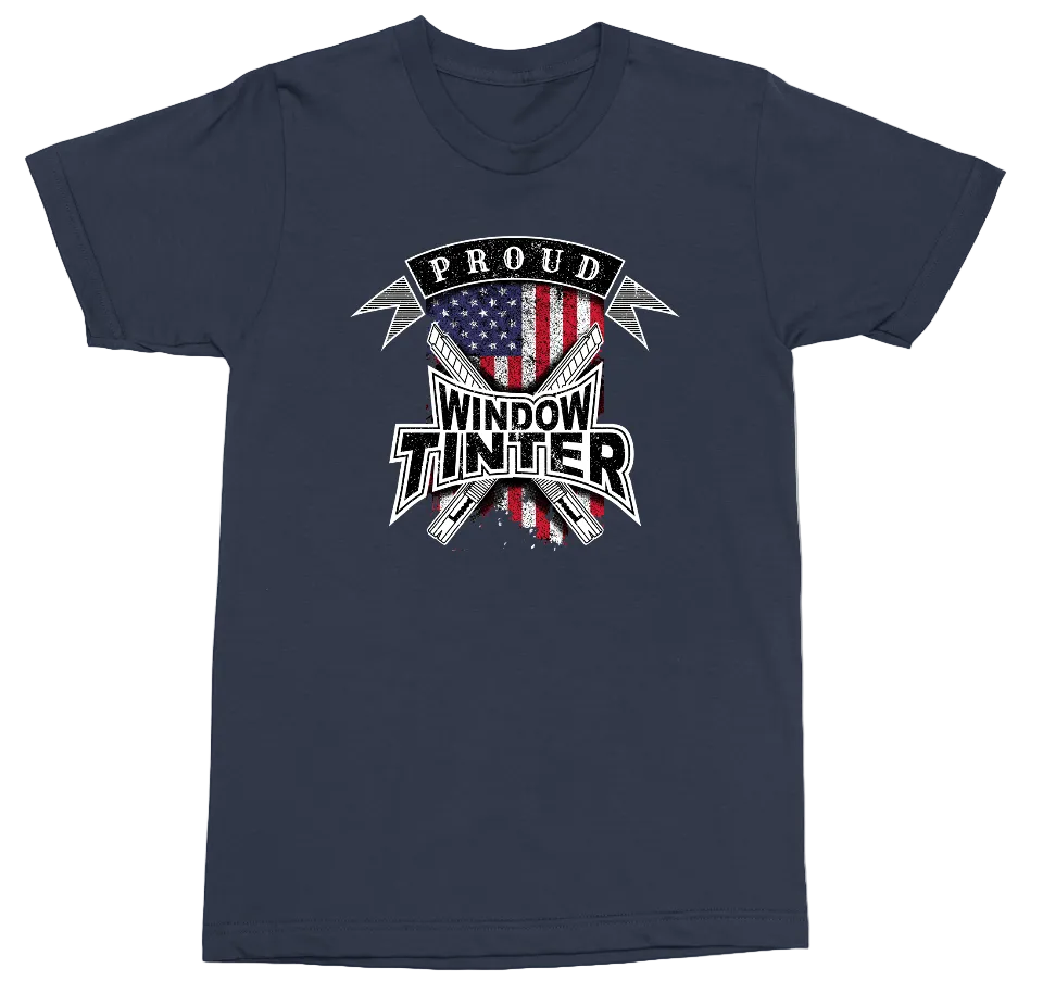 A navy blue crewneck t-shirt featuring a graphic on the chest that reads 'PROUD WINDOW TINTING' with a stylized American flag, crossed tools, and a banner.