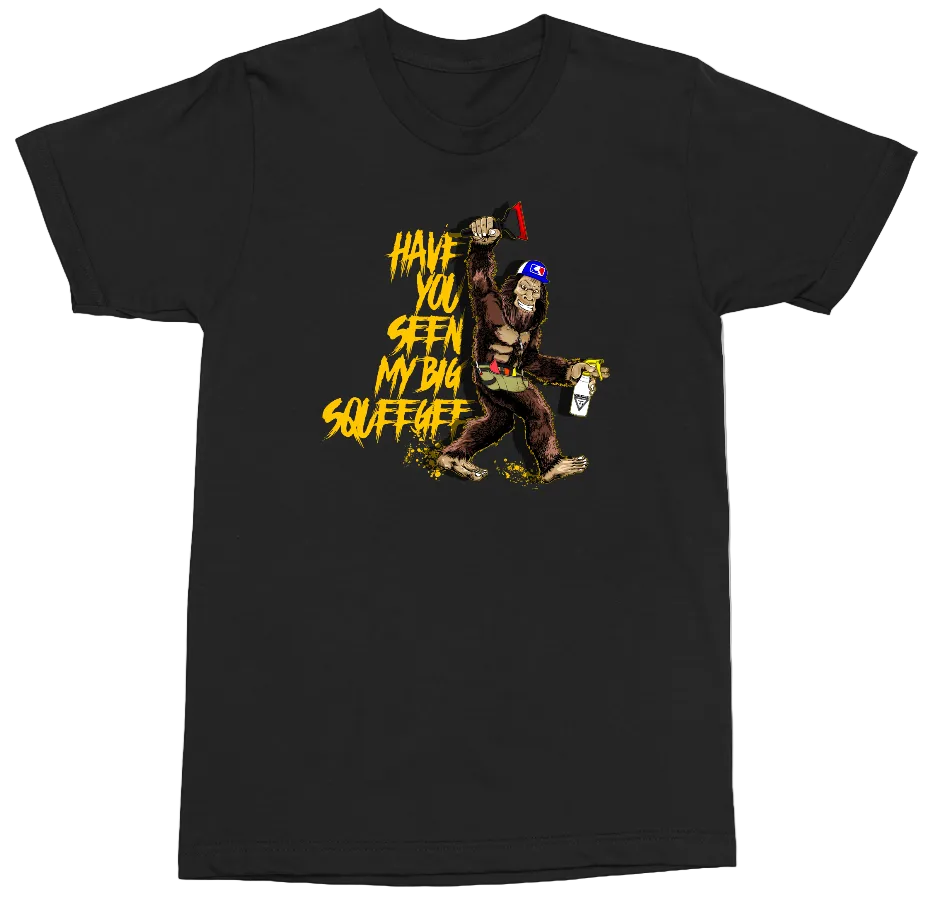 A black short-sleeve crewneck t-shirt featuring a graphic print of a Bigfoot character dancing and holding a spray paint can, with the text 'HAVE YOU SEEN MY BIG squeegee' in yellow.