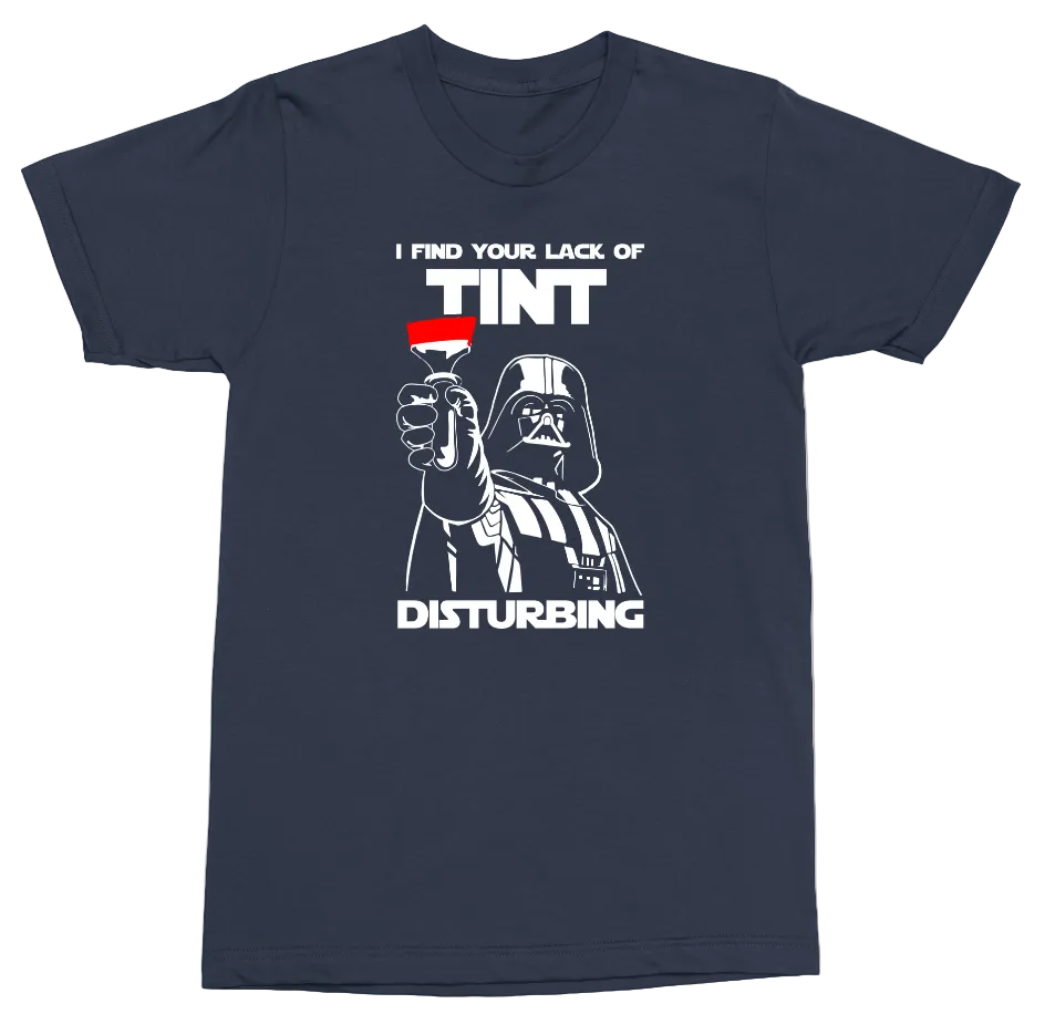 A navy blue short-sleeve t-shirt with a white graphic print of Darth Vader holding a wine glass, with the text 'I FIND YOUR LACK OF TINT DISTURBING' and a small red-and-white flag graphic.