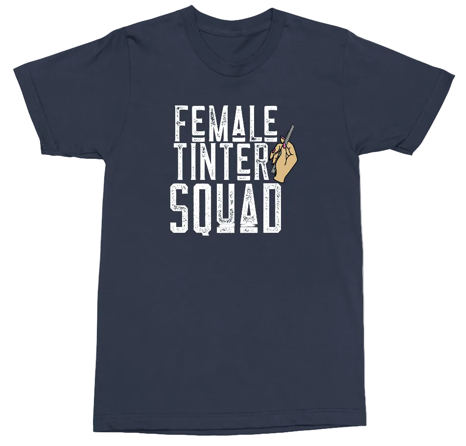 A navy blue short-sleeve t-shirt with a graphic on the front that reads 'FEMALE TINTER SQUAD' in distressed white letters, accompanied by a small tan hand holding a paintbrush.