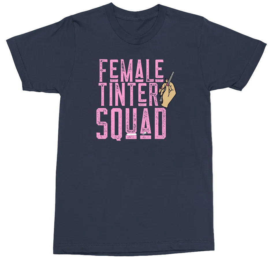 A navy blue short-sleeve t-shirt with a graphic on the front that reads 'FEMALE TINTER SQUAD' in pink glitter-style letters, accompanied by a small illustration of a hand holding a paintbrush.