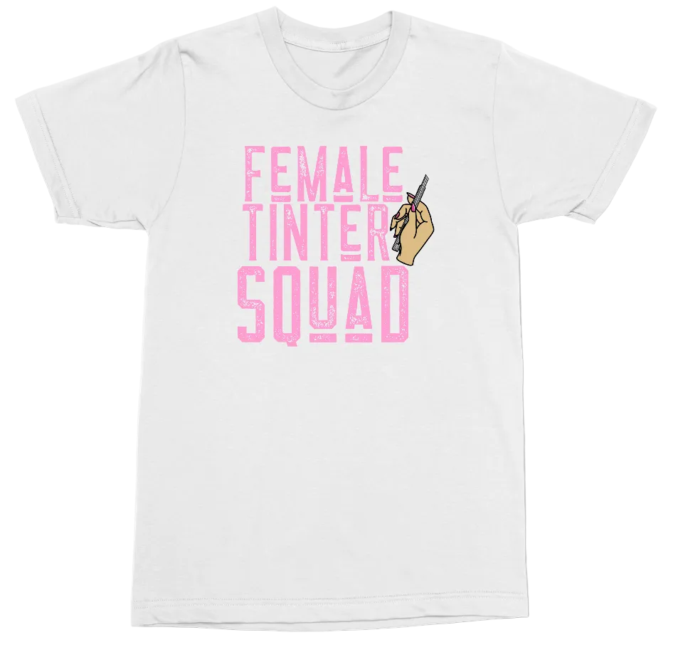 A white short-sleeve crewneck t-shirt featuring a graphic print on the front with the words 'FEMALE TINTER SQUAD' in pink block letters and a small hand holding a pen.