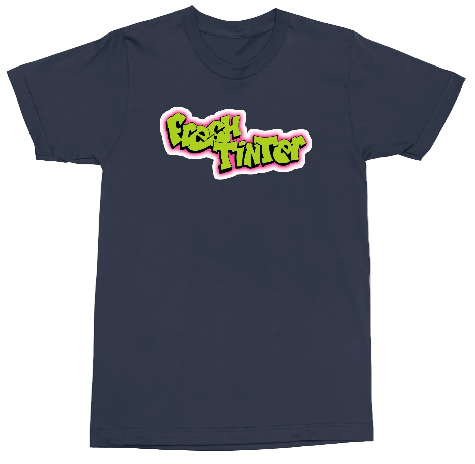 A navy blue short-sleeve t-shirt with a colorful graphic on the chest reading 'FRESH TINTED' in a stylized yellow-green bubble font with a pink outline.