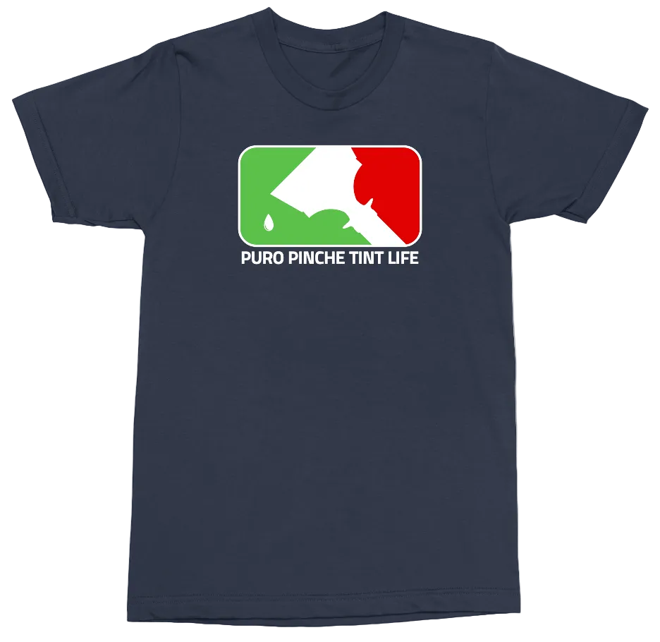 A navy blue short-sleeve crewneck t-shirt featuring a graphic on the chest with the text 'PURO PINCHE TINT LIFE' and a green, white, and red paint-splatter logo, displayed on a clean white background.