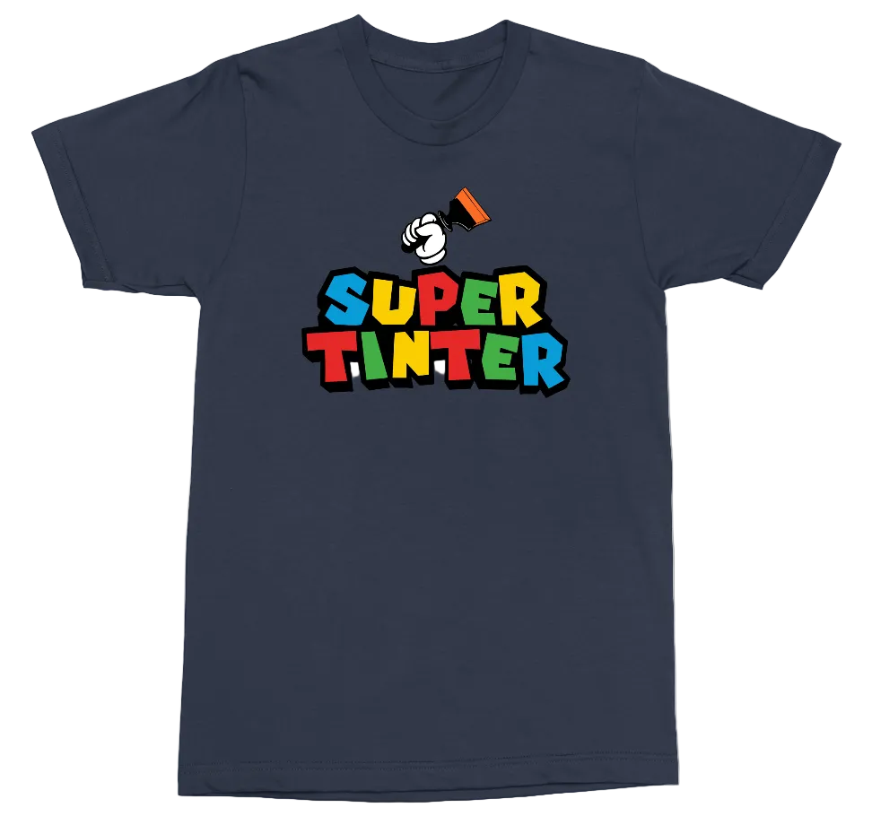 A navy blue short-sleeve t-shirt with a colorful graphic on the chest. The graphic features the text 'SUPER TINTER' in bold, multi-colored letters (red, orange, yellow, green, blue, black) with a cartoon character wearing a red hat above it, set against a plain white background.