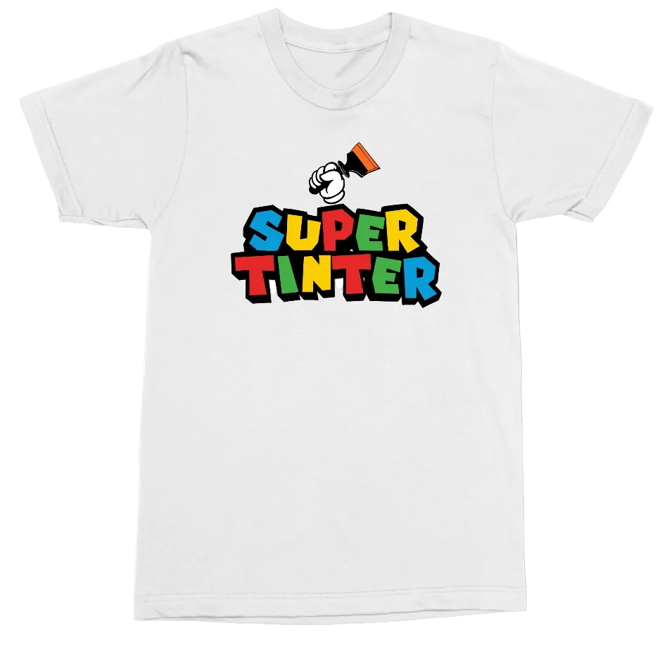 A white short-sleeve crewneck t-shirt featuring a colorful graphic on the chest that reads 'SUPER TINTER' in bold, multi-colored block letters with a cartoon character holding a megaphone above it.