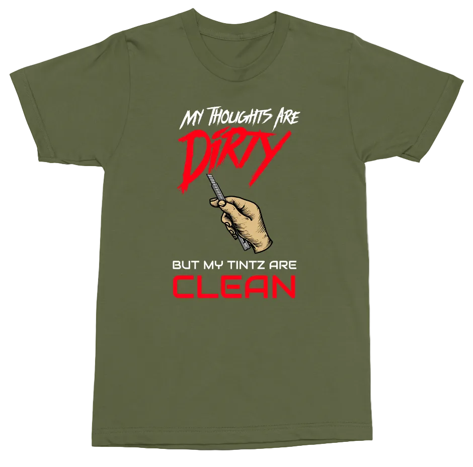 An olive green short-sleeve t-shirt with a graphic print on the front. The design features the text 'MY THOUGHTS ARE DIRTY' in white and red, a hand holding a knife, and 'BUT MY TINTZ ARE CLEAN' in white and red.