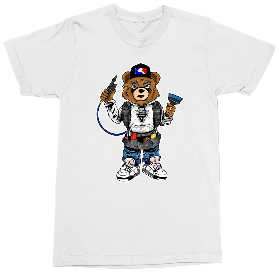 A white short-sleeve crewneck t-shirt featuring a cartoon graphic of a bear character dressed as a firefighter, complete with a helmet, backpack, hose, and tools.